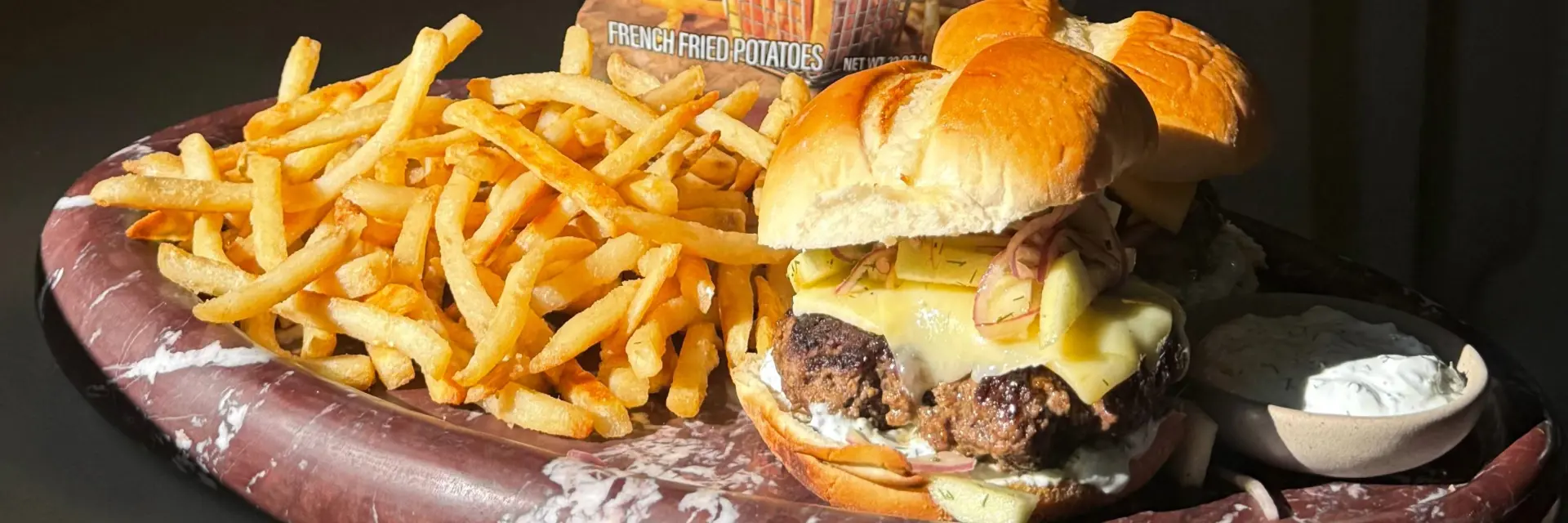 Cheeseburger with Crispy Shallots and Apple Slaw featuring McCain Craft Beer Battered Fries