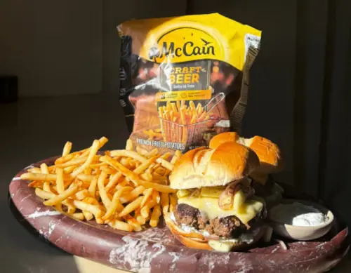 Cheeseburger with Crispy Shallots and Apple Slaw featuring McCain Craft Beer Battered Fries